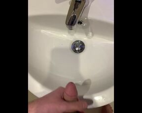 Shooting my cum in to the hotel sink